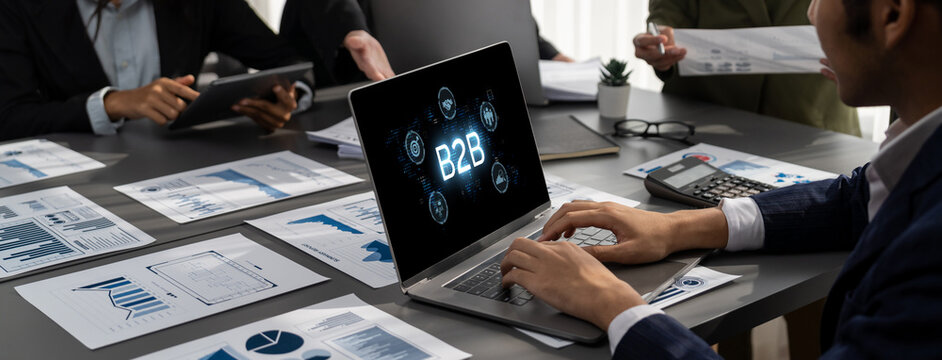 Business person navigates B2B landscape, harness technology to enhance business-to-business connections. Discover reshapes B2B interaction, driving innovation in business-to-businesses strategy. brisk