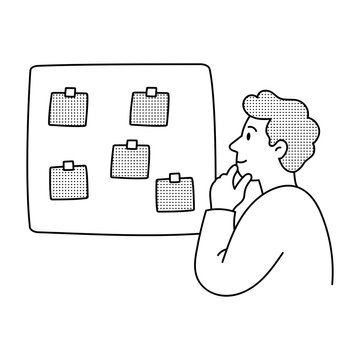 Researcher grouping notes and cards into organized clusters on a visual board.