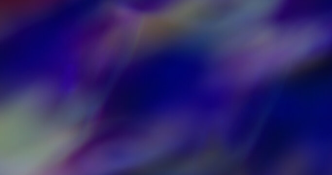 Bokeh texture. Bright light. Purple blue yellow colorful lens flare optical glisten kaleidoscope on abstract luminous art background.