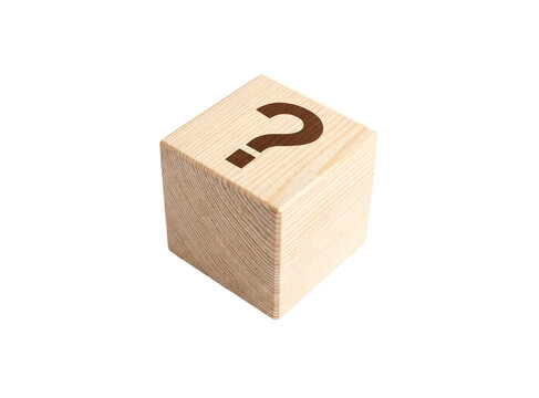 Wooden cube with question mark symbolizes unknown future, problem solving, challenge, and uncertainty in business.
