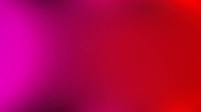 A smooth gradient transitions from a deep magenta on the left to a vibrant red on the right, creating a soft, luminous background with subtle light variations.