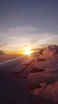 airplane in the sky at sunset