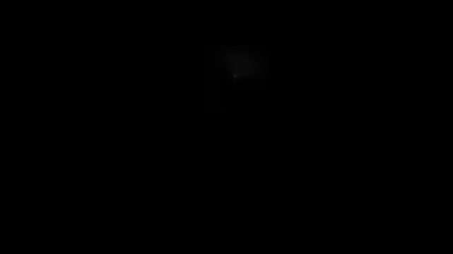 Black background displays a minimal faint spot of light centered in complete darkness.