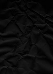 Obraz premium Black crumpled paper texture surface features dark matte folds with shadows for minimalist artistic background design projects requiring moody aesthetic depth or dramatic industrial effect.
