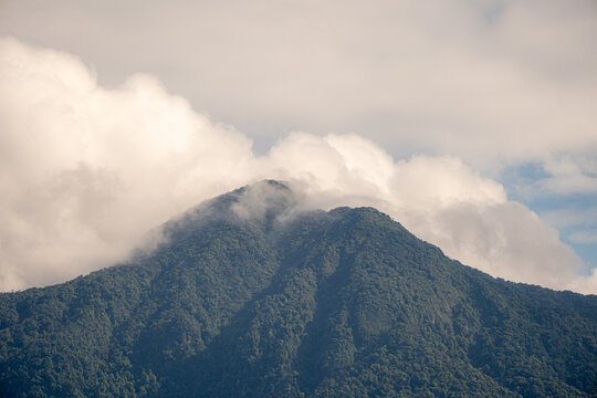 Majestic green mountains covered by flowing white clouds in Y Ty, Lao Cai province, Vietnam