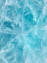 Obraz premium Cyan crystalline ice texture captured in a potrait format for website backgrounds, UI design, and creative editorial content.