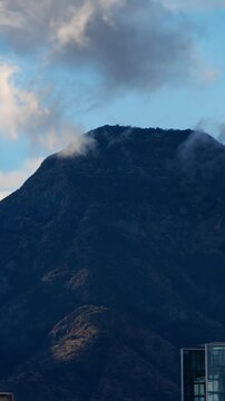 manquehue hill santiago Chile skyline mountain clouds panoramic landscape vertical