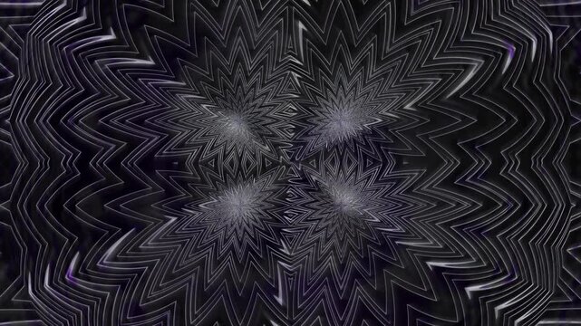 A design with star shapes in various shades of gray. The pattern creates a dynamic visual effect on a dark background