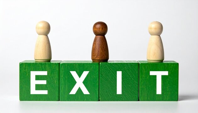 Wooden figurines stand on exit blocks in transition