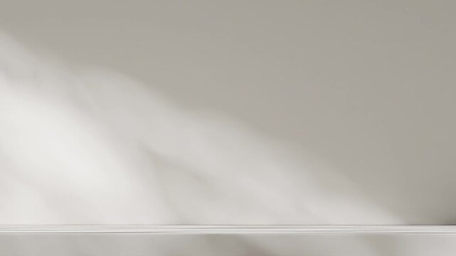 video footage of backdrop poster design, on a bare, understated room with bright white color