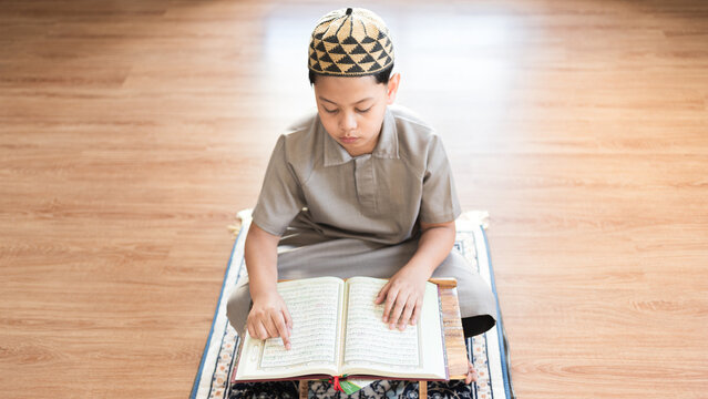 Concentrated youthful believer demonstrates authentic religious discipline studying holy manuscript reflecting traditional educational heritage and profound inner tranquility