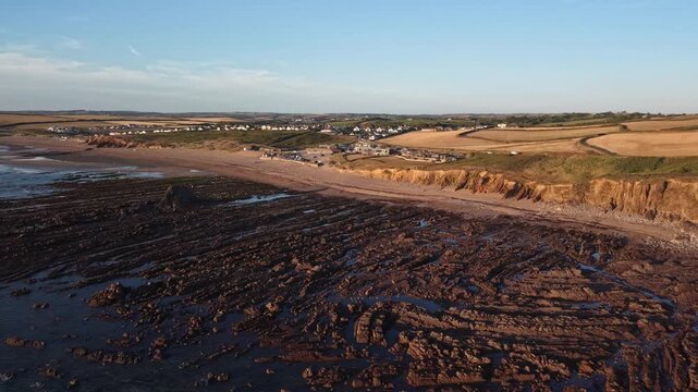 Dried up grass and fields on the cliffs  by the coast in the West Country in hot August