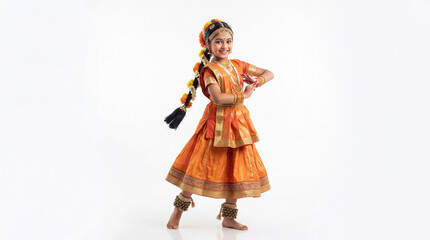 Fototapeta premium Young girl performing traditional indian classical dance in orange costume with floral hair braid cultural celebration