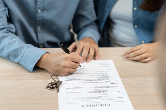lease, rental and selling home. Couple sign contact for new house or real estate. rent house, Sales, loan credit financial, insurance, Seller, dealer, installment,  buy, sell, move in