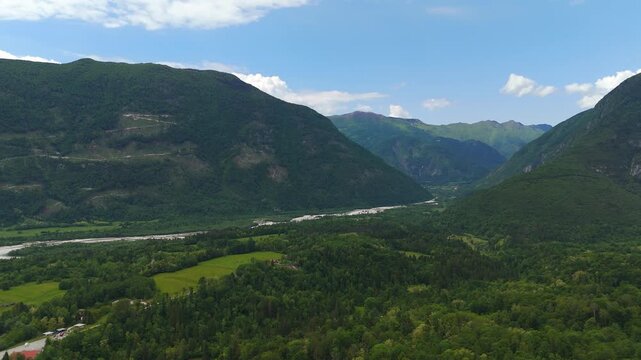Aerial: Soca valley during the day in Posocje region, Slovenia, Europe, orbit drone shot