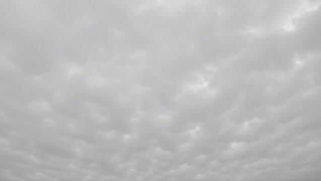 Overcast grey sky filled with thick clouds on a gloomy day