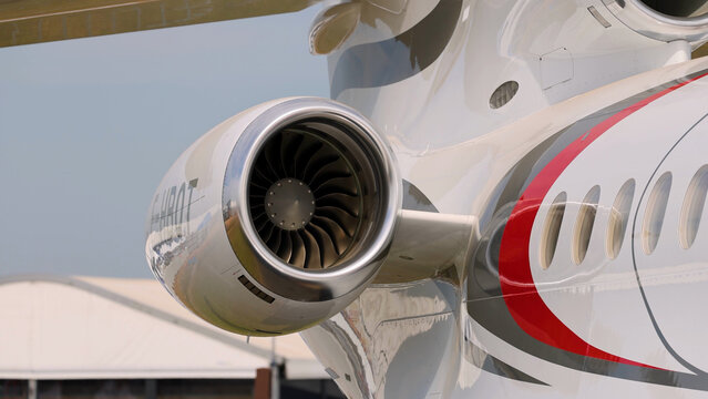 Close-Up of a Modern Business Jet Engine and Fuselage