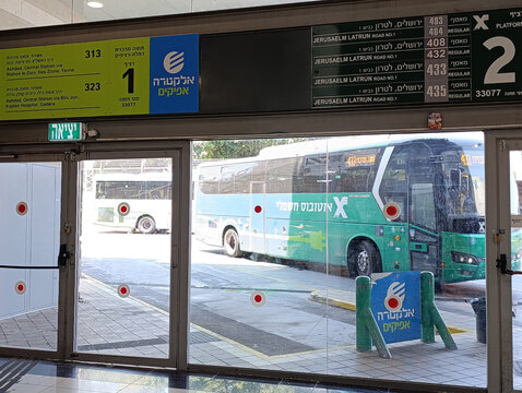 Ramla, Israel - 9 Aug 2026. Ramla Central Bus Station in Israel, known locally as Tahana Merkazit, with passengers, buses, and urban public transport.