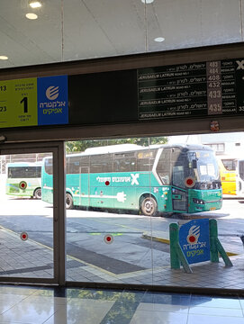 Ramla, Israel - 9 Aug 2026. Ramla Central Bus Station in Israel, known locally as Tahana Merkazit, with passengers, buses, and urban public transport.