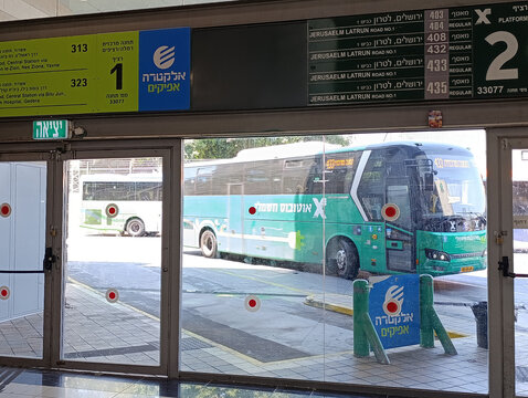 Ramla, Israel - 9 Aug 2026. Ramla Central Bus Station in Israel, known locally as Tahana Merkazit, with passengers, buses, and urban public transport.