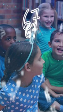Animation of letters moving over happy school children in school