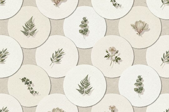 Seamless pattern featuring circular paper cutouts with various hand-drawn botanical including ferns, eucalyptus, roses, and ivy leaves