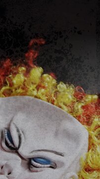 Scary clown mask falling over grey surface against flickering background