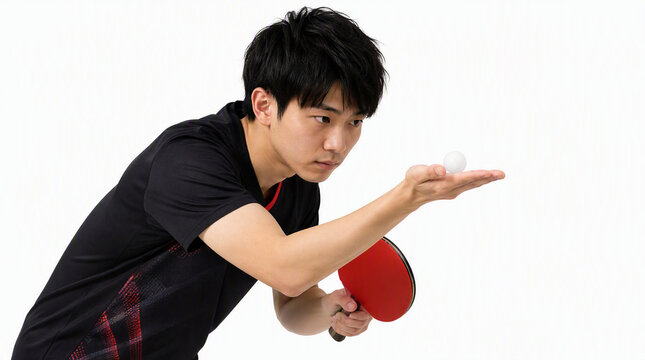 サーブを打つ構えの卓球選手