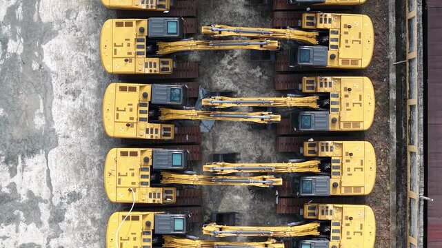 Excavator sales or rental places, many excavators are parked in a row to be shown off