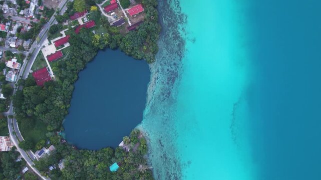Aerial exploration of Bacalar Lagoon showcasing freshwater cenotes and tropical landscapes