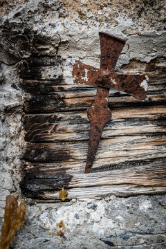 Iron Cross nailed to a wooden post, cemetery, Adishi village, trans-Caucasian trail, Upper Svaneti, Caucasus mountain range, Georgia