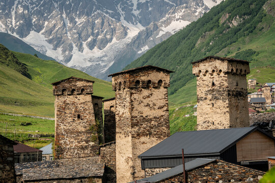 Ushguli village with the snowy mountain in the background, trans-Caucasian trail, Upper Svaneti, Caucasus mountain range, Georgia