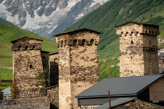 Ushguli village with the snowy mountain in the background, trans-Caucasian trail, Upper Svaneti, Caucasus mountain range, Georgia