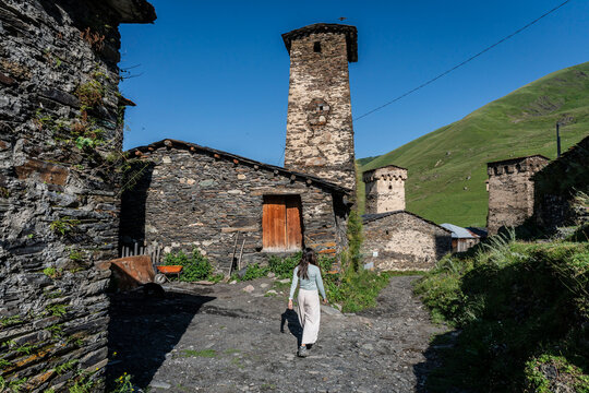 young woman on the street, Ushguli village, trans-Caucasian trail, Upper Svaneti, Caucasus mountain range, Georgia