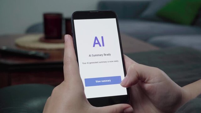 Hands operate a modern phone showing an AI summary ready message with a blue view summary button in a relaxed living room.