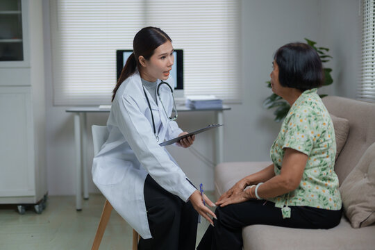 Doctor discussing health with senior patient during medical consultation