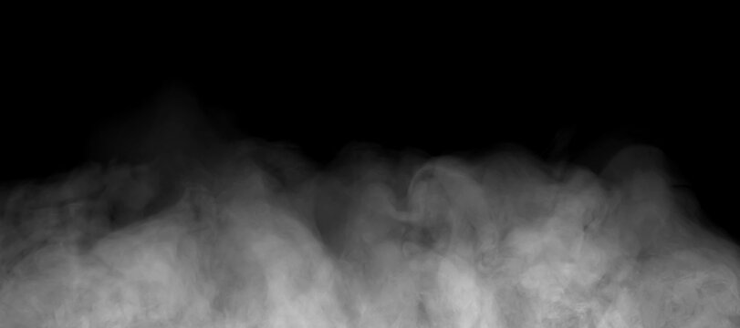 Abstract white smoke rolling across a black background, creating a soft atmospheric texture for cinematic effects overlays, backgrounds, dramatic designs transitions, and creative visual compositions.