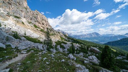 Fototapeta premium Scenic mountain landscape in the Dolomites of northern Italy with dramatic rocky peaks, alpine meadows and majestic mountain scenery. The Dolomites are a popular destination for hiking.