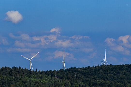 Wind turbines among the Carpathian Mountains. Ecological energy concept in Ukraine
