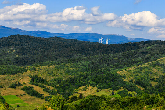 Wind turbines among the Carpathian Mountains. Ecological energy concept in Ukraine