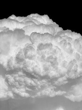 Sprouting Cumulonimbus clouds in spectacular black and white shot