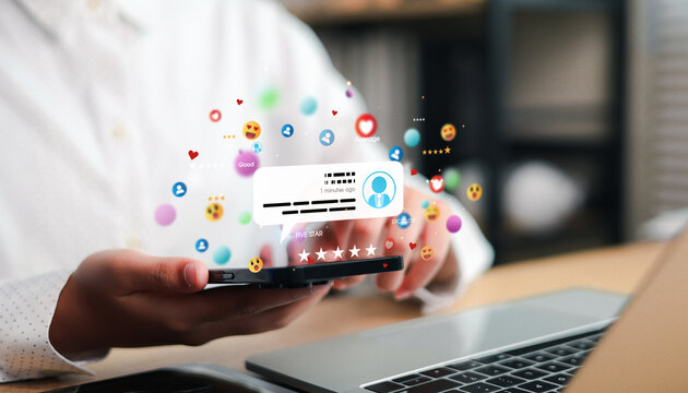 Customer using a smartphone to share online reviews and ratings, illustrating social engagement, customer feedback, brand reputation, digital marketing.