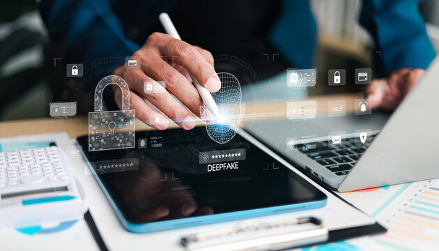 Cybersecurity professional using digital devices with AI deepfake detection interface, illustrating identity verification, facial recognition, data protection,