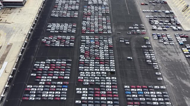 Aerial view of a new car distribution center parking lot