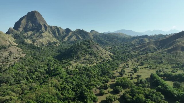 Aerial view of the lush green mountainous landscape of Nuca Molas in Satar Mese Barat, East Nusa Tenggara, Indonesia.