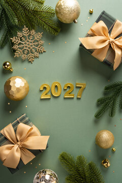Merry Christmas and Happy NewYear 2027 gold gifts and vertical ornaments on green background