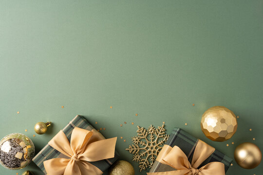 Merry Christmas and Happy New Year gifts with gold ornaments and green wrapping for holiday celebration