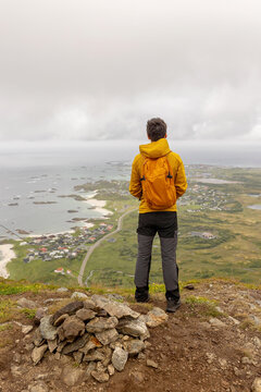 Mount Royken hike, family with children and pet dog, hiking Andhue and Royken peak summertime, looking over Andenes, Andoya