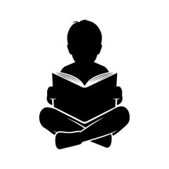 Silhouette of a young boy reading a book.