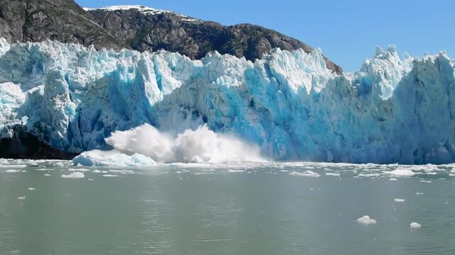 Glacier melting in summer as a consequence of climate change, global warming, and climate crisis.